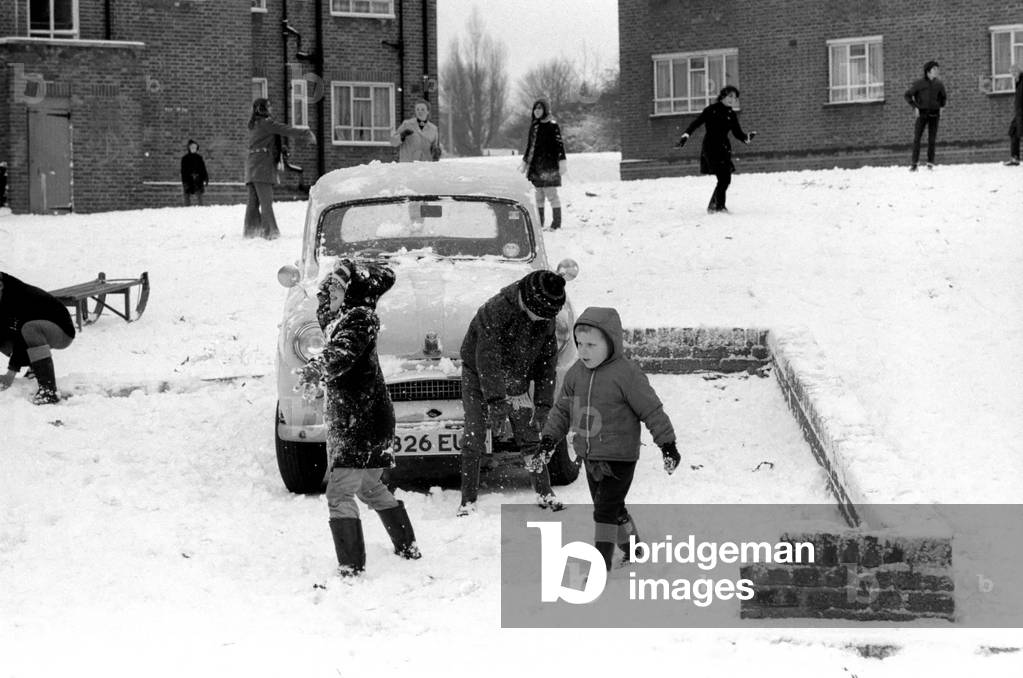 Weather: Winter Scenes: Children from the Grange estate East Finchley take advantage of yesterday's snow. November 1969