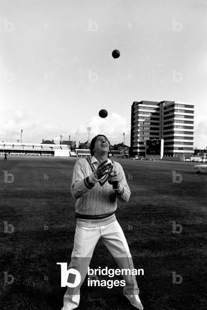 Cricketer Derek Randall. Derek Randall and his repertoire of tricks photographed at Trent Bridge as he prepares for the new season. Juggling the cricket balls. April 1977 (b/w photo)