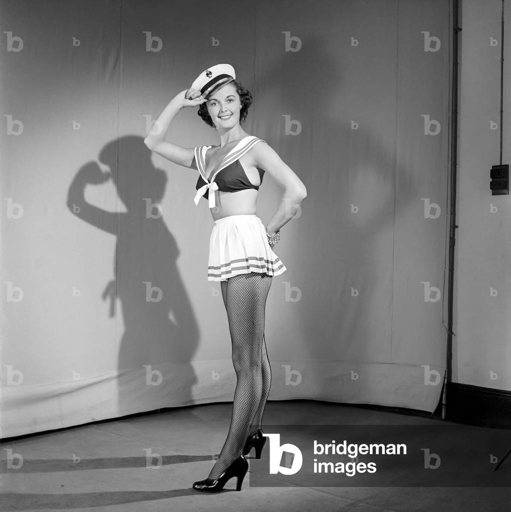 Model wearing fancy dress sailors outfit, 1959 (b/w photo)