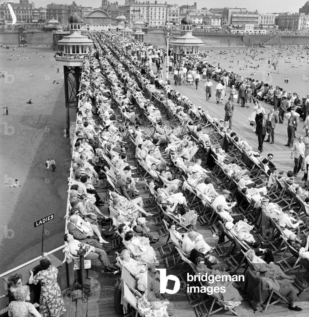 Bank holiday at Blackpool. Beach scenes/crowds/sunbathing. June 1960