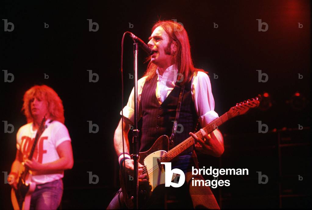 Francis Rossi playing at the Hammersmiths Odeon with his band Status Quo