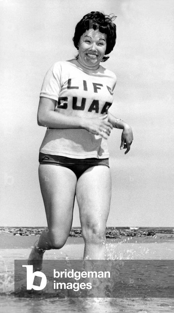 Student Stephanie Keenen who has just started work on Roker beach at Sunderland as the town's first female lifeguard, August 1972 (b/w photo)