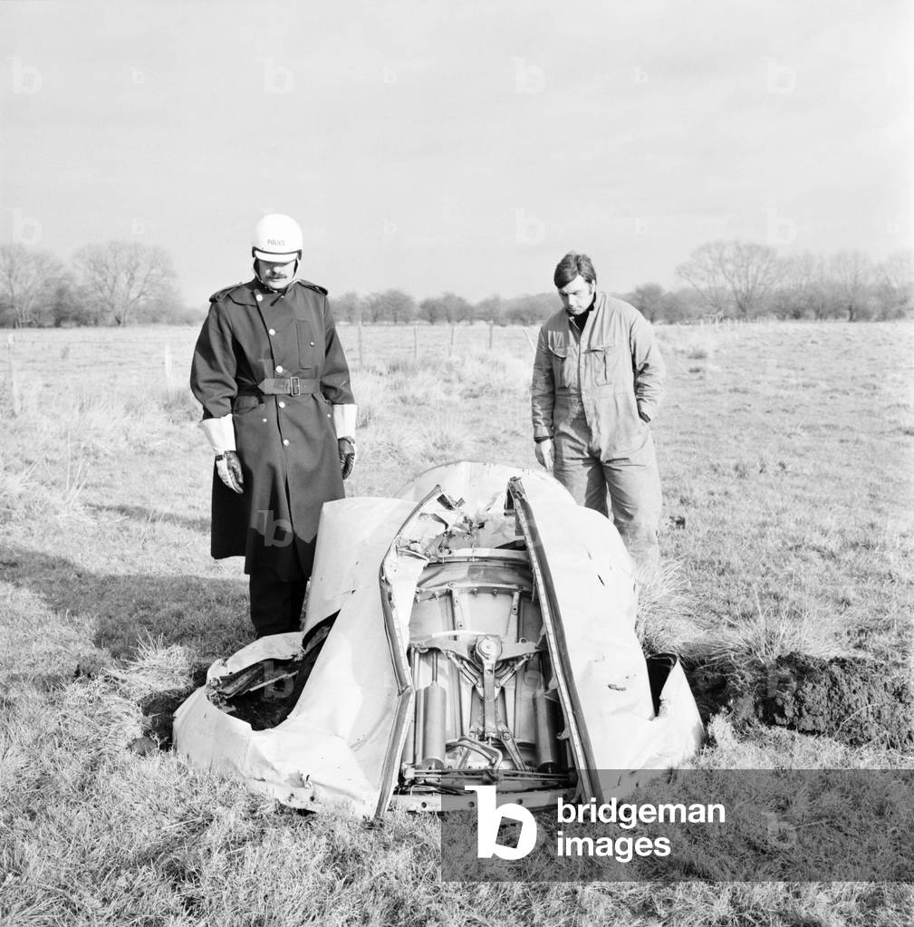 A VC10 plane on fire after leaving Heathrow Airport today. The largest piece of the aircraft. thought to be the rear assembly in a field only half a mile from a residential area of Reading, Berkshire.
