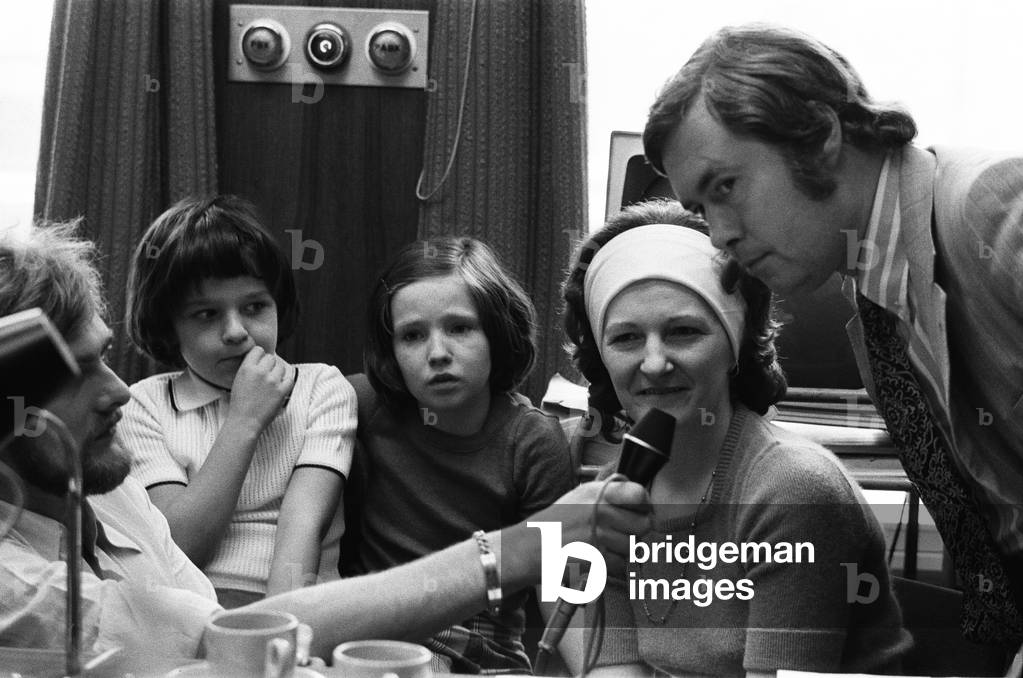 Michael Relton, Solicitor, is interviewed on the Jimmy Young Radio Programme after helping to reunite two children, Anita 9 and David 7, back together with their mother Ita Siddiqi, their father had taken them to Germany, pictured at BBC Langham Place, 19th July 1973 (b/w photo)