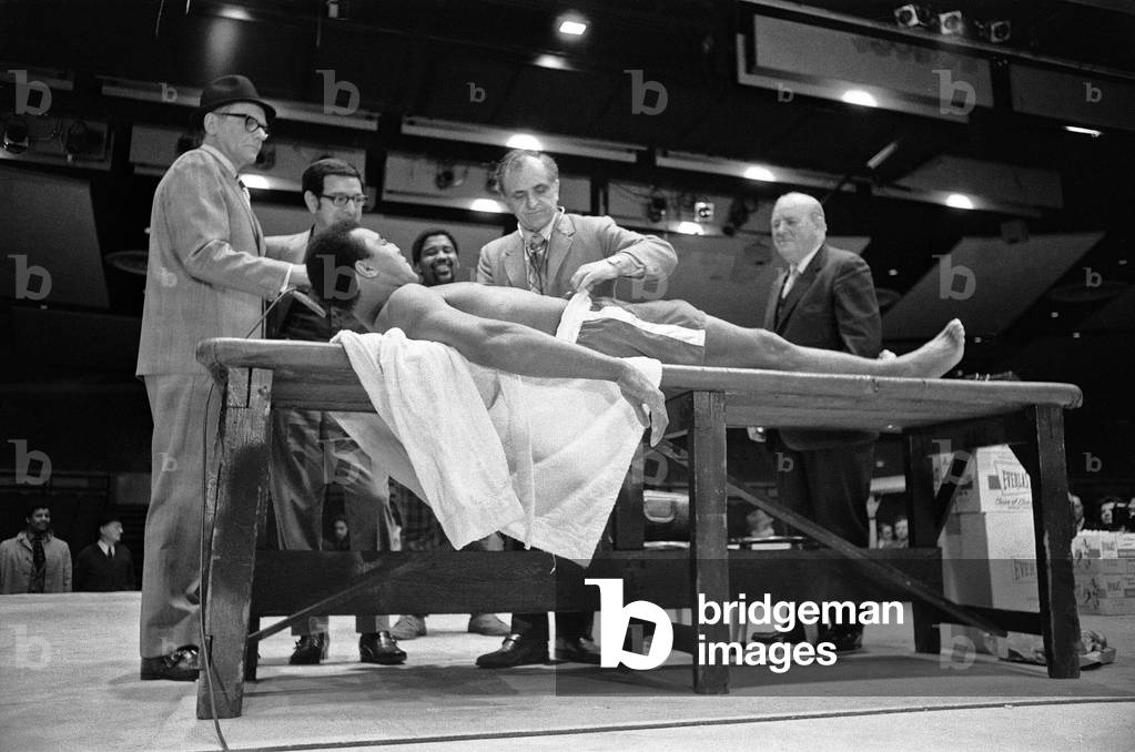 Muhammad Ali having a pre-fight medical ahead of his clash with Smoking Joe Frazier to be held at Madison Square Garden in New York City. 4th March 1971 (b/w photo)
