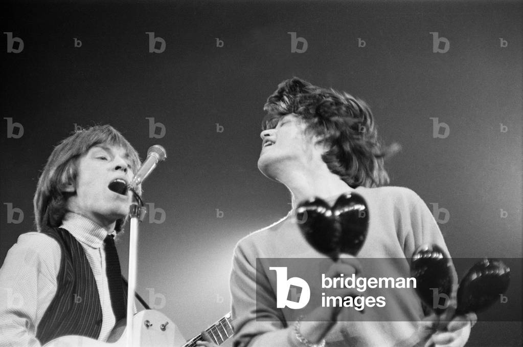 The Rolling Stones perform at the Mew Musical Express Poll Winners All Star Concert at Wembley. Brian Jones and Mick Jagger.
26th April 1964.