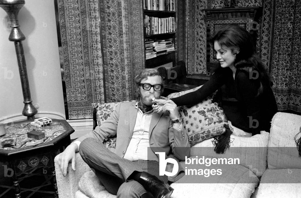 Actor Michael Caine pictured at his home in Grosvenor Square, also pictured is girlfriend Minda Feliciano from the Philippines. November 1969 Z11244-003