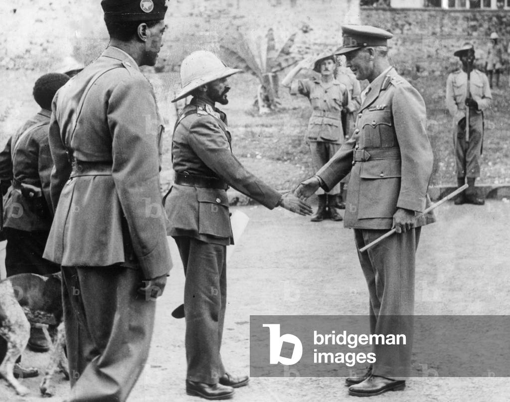 Ethiopian Emperor Haile Selassie is greeted by Lieutenant General Cunningham, the General Officer in Command of the British Expeditionary Forces, at the place in Addis Ababa as he returns in triumph to the capital of his liberated country during the Second World War, June 1941 (b/w photo)