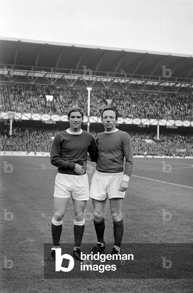 Nobby Stiles in action during the match between Manchester United and Everton: Nobby stiles and Alan Ball seen here during the Manchester United v. Everton game. October 1966 W9190b-004 (photo)