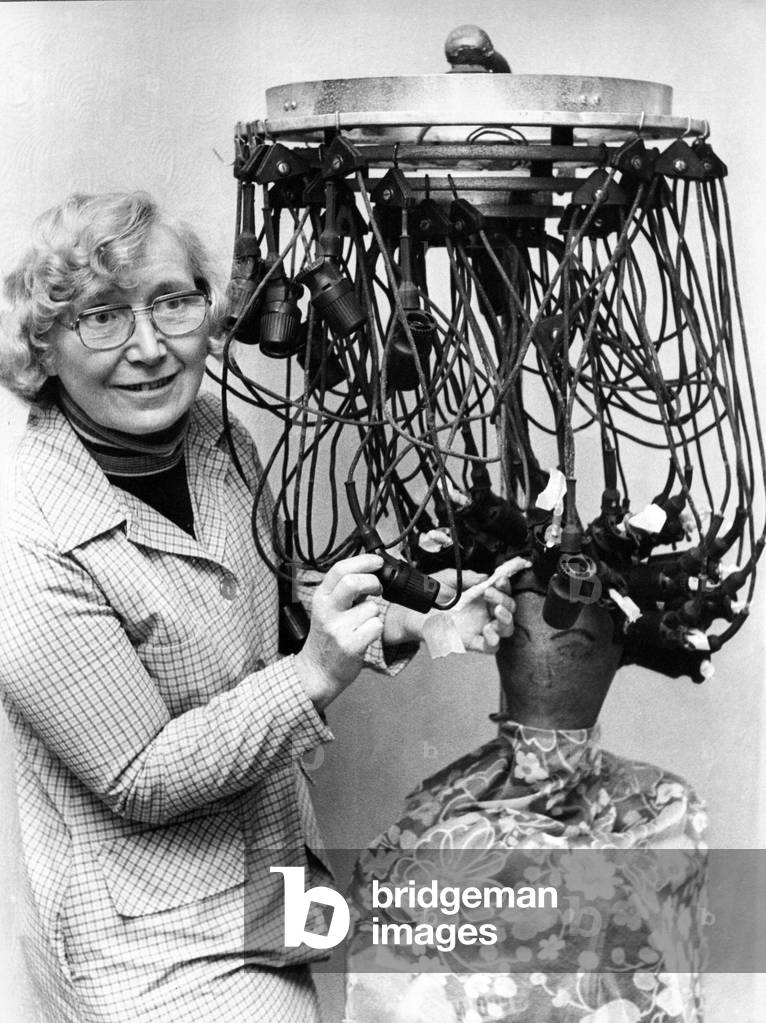 Irene Douglas with her strange looking antique permanent waving electrical outfit at Beamish Museum