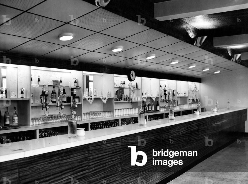 Birmingham's Hall Green greyhound stadium. One of the three bars at the stadium. 15th January 1958 (b/w photo)