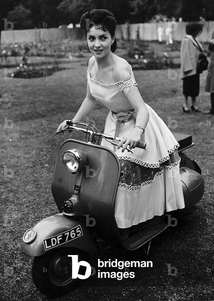 Gina Lollobrigida Actress on a scooter. 1952