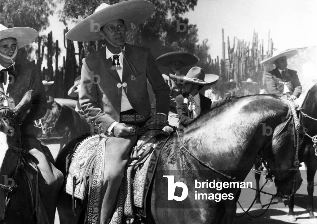 Philip The Duke of Edinburgh in the costume of a Cowboy, when he broke his nine-day tour of Central America with a visit to a hacienda. October 1964 (b/w photo)