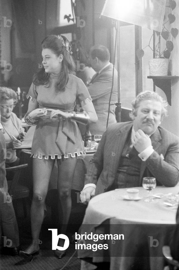 Unusual for Lynda Baron the singer cabaret and television star, appears as a mini skirted waitress in the film 