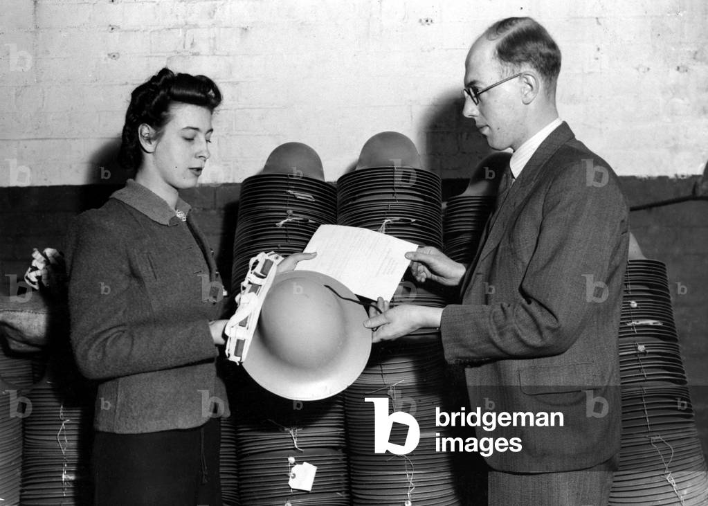 These helmets were worn by Fire watchers and were probably made by Tuck & Blakemore Ltd. of Trinity Street, Coventry, c. 1940 (b/w photo)