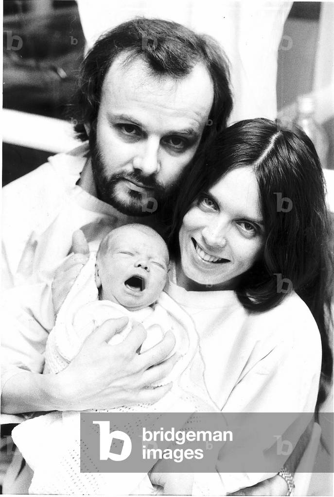 DJ John Peel with wife Sheila and new born baby son 1976
William resting in hospital