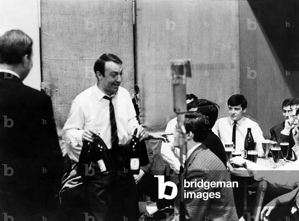 Spurs for the hit parade. The Spurs team made a recording, E. M. I. studies of songs ranging from Glory, Glory,. , Hallelujah, Hello Dolly and I Belong to Glasgow. The disc will be released in time for the Cup Final. October 1969 (photo)