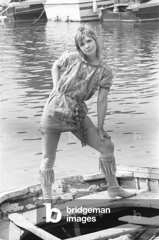 This 21 year old, ratty haired, green eyed Katy Manning was picked from an audition of 70 actresses to play the assistant Jo Grant in the new Dr Who series. Katy is the daughter of the well known sports writer J. L, Manning, and is seen here on the banks of the River Thames near Strand on the Green 2nd August 1970 (b/w photo)