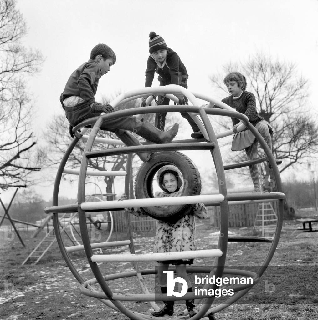Children playing in the adventure playground at Basildon town centre. December 1969