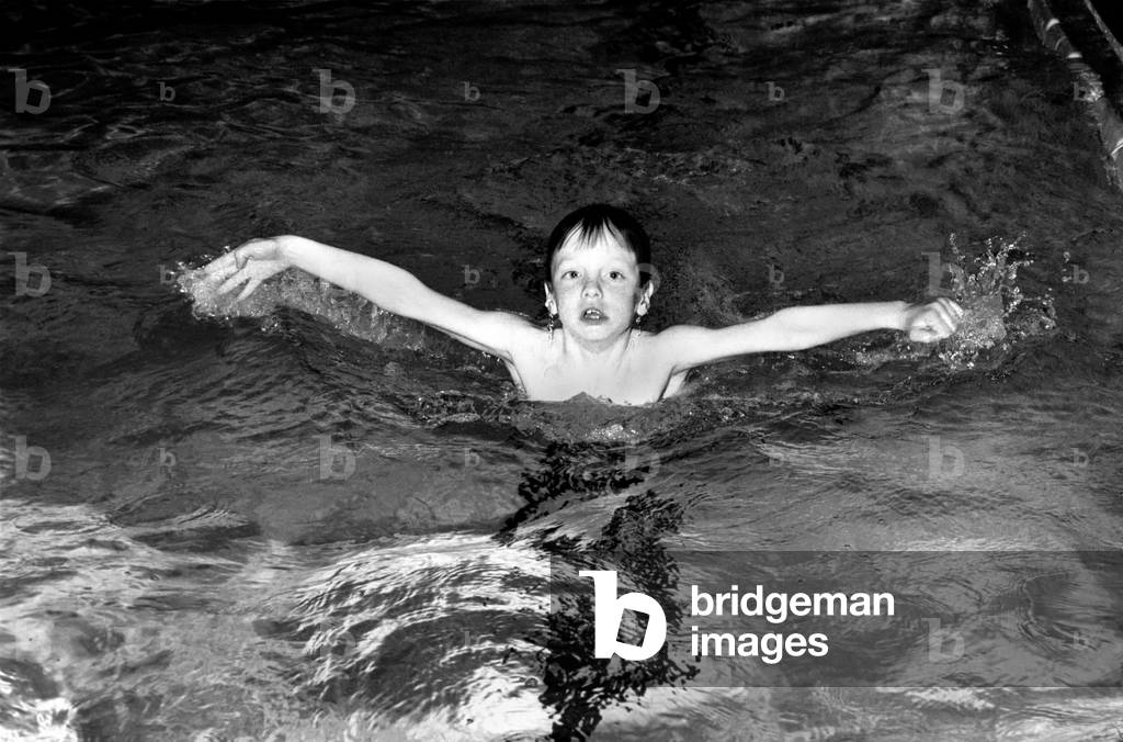 7 year old Alexander Nice who is a member of the Dover Lifeguard Club, at a Dover swimming pool, April 1975 (b/w photo)
