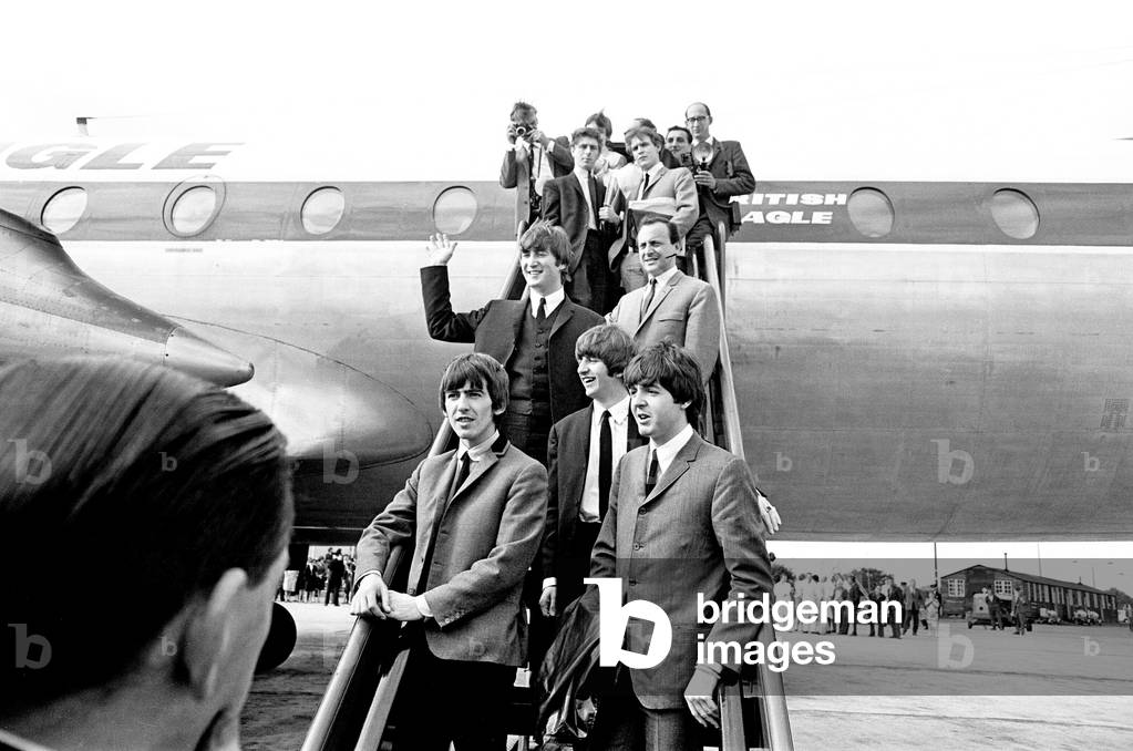 The Beatles arrive in liverpool for the Northern Premier of 