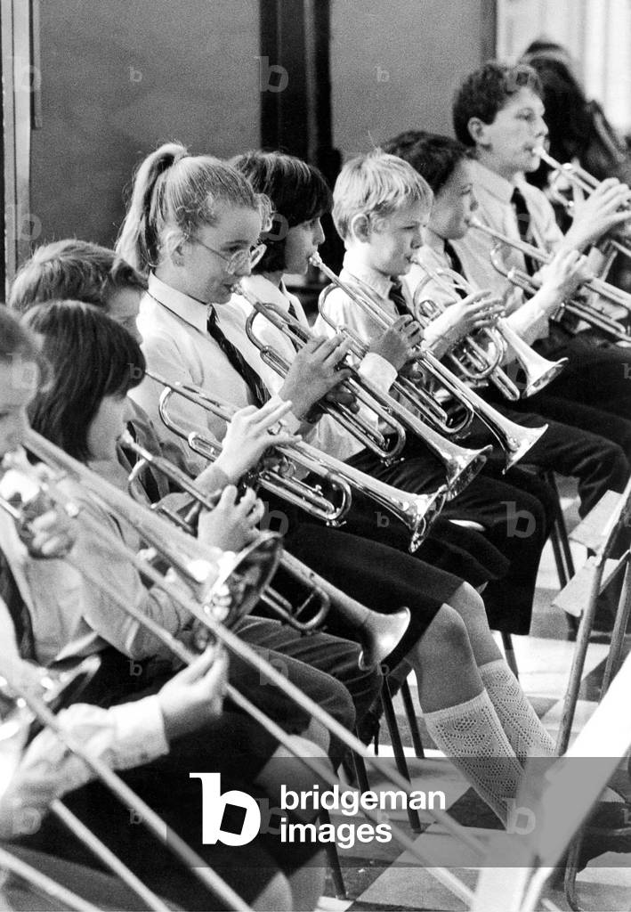 Children from Gosforth Central Middle School learning to play instruments on May 4, 1989 (b/w photo)