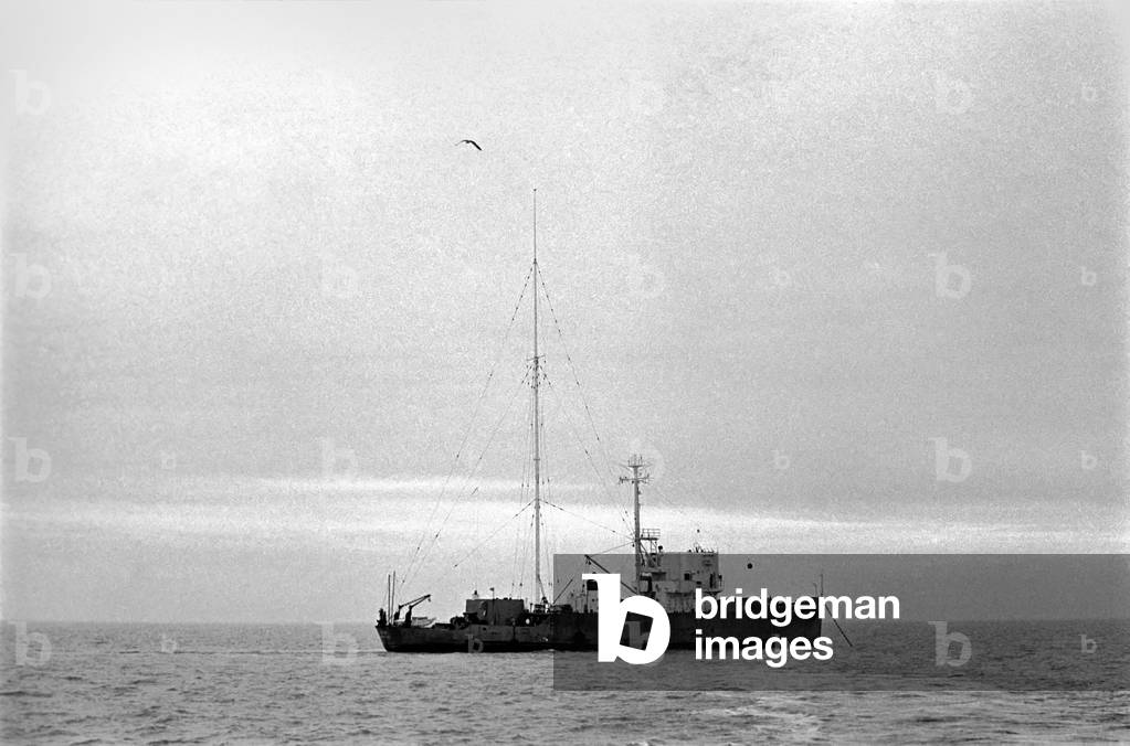 Radio London: Pirate Radio Station. General scene around the Motor Vessel Galaxy which is home to Radio London. Whilst the disc jockeys broadcast to the nation, the skipper ensures that they keep 12 miles off shore, the chef prepares a meal and the technicians ensure that equipment is working, 1965 (b/w photo)