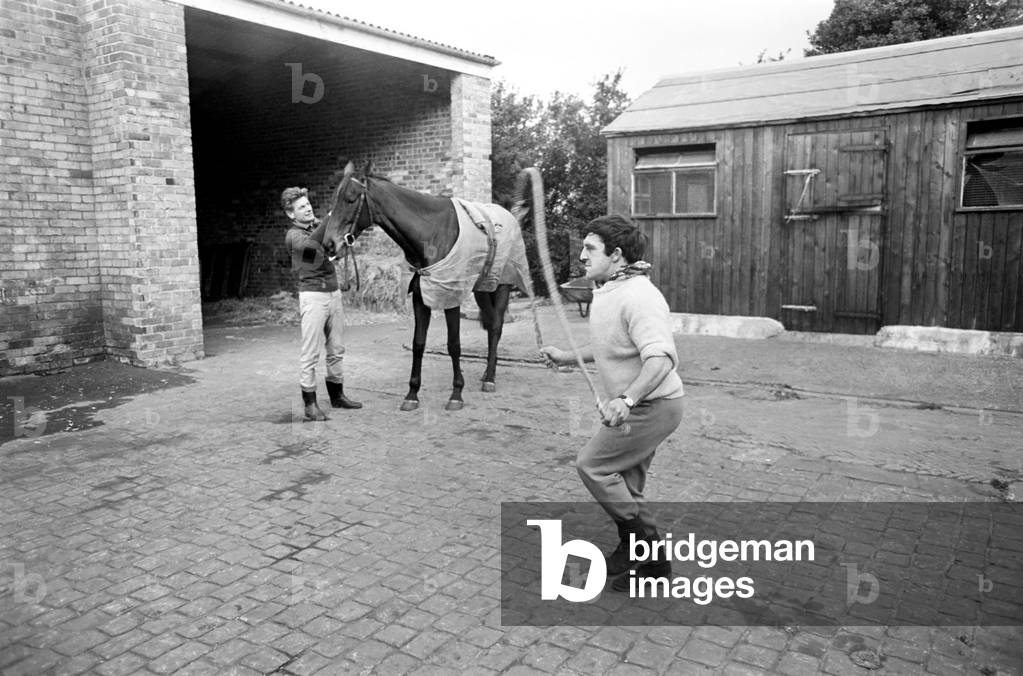 Jockey Billy Ellison training in the stable yard. 
November 1969