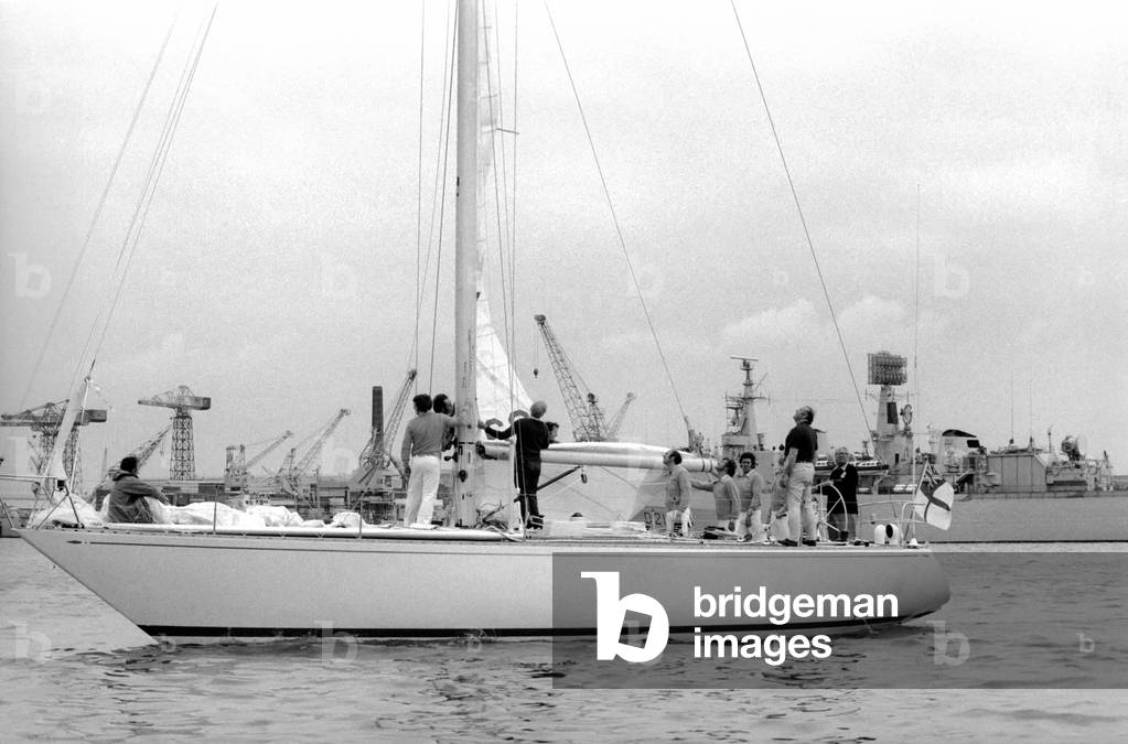 Former Conservative Party leader Ted Heath at the helm of Morning Cloud yacht, May 1975 (b/w photo)