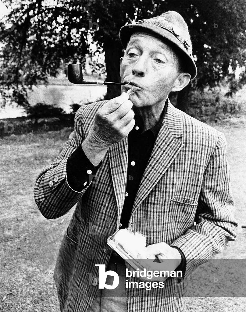 Bing Crosby in the English Lake District to make film on fishing for US TV. Fishing was one of his favourite pastimes, along with his pipe of course. 1966