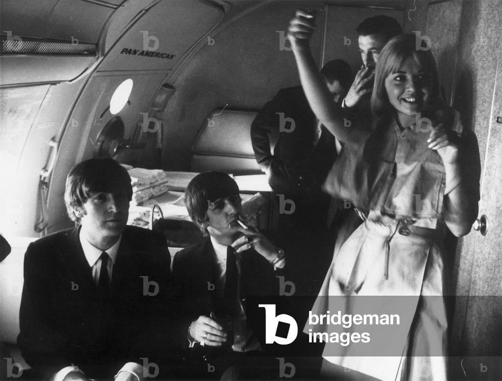 The Beatles on Pan Am Flight 101 from London Heathrow Airport to New York for a 10 day tour of the United States of America 7th February 1964.