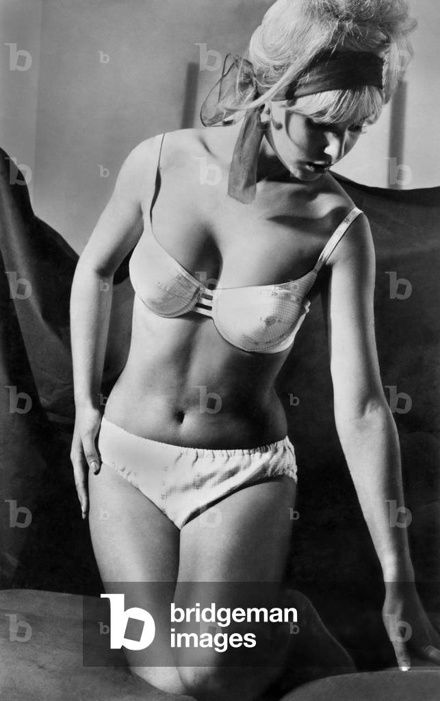 Clothing Beach. New swimwear for Spring 1963, here is one style that has not gone out of fashion and looks like staying with us for keeps - the bikini. January 1963 P017971