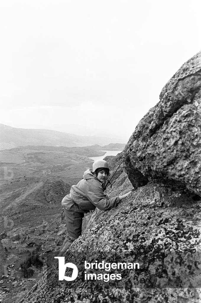 Plas Dol-y-Moch, Coventry's Outdoor Education Centre, situated in the heart of the Snowdonia National Park. 13 year old Bobby Ramzan tackles the rock face. Maentwrog, Gwynedd, Wales, 26th October 1987 (b/w photo)