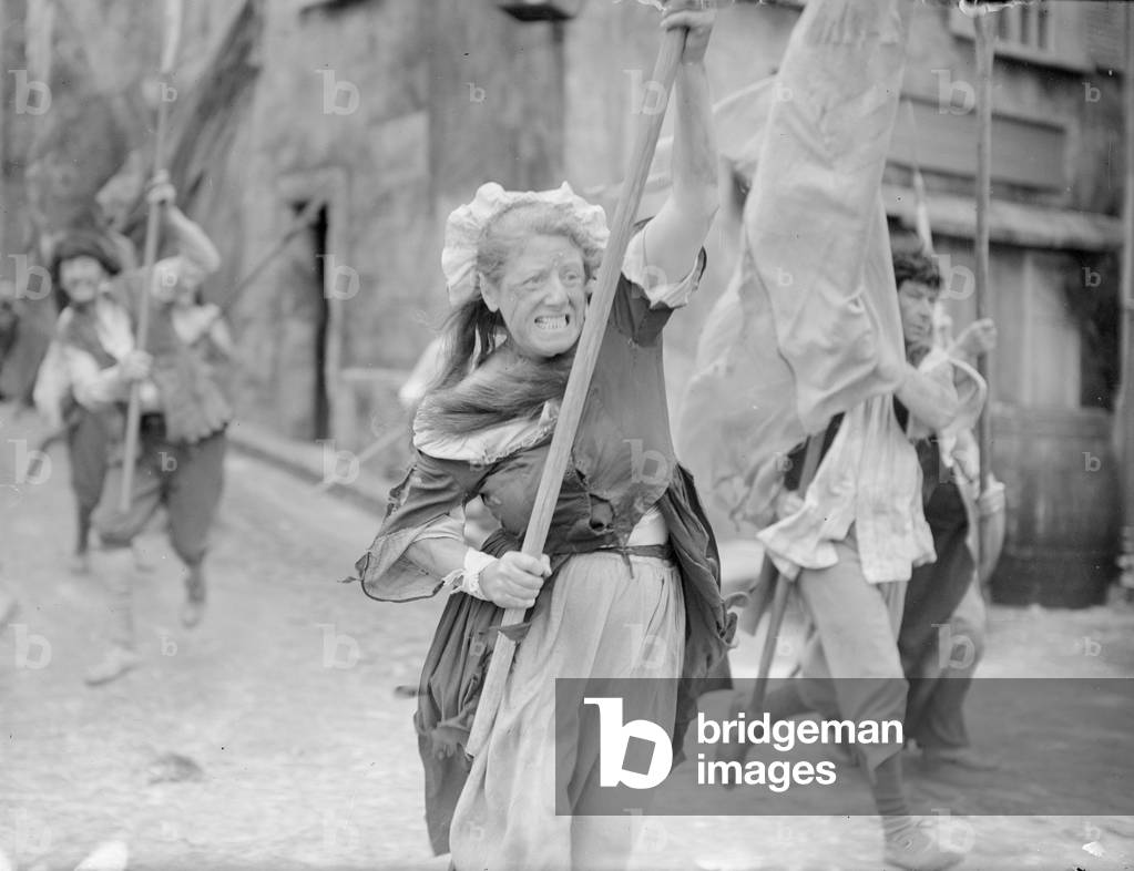 Rita Tobin seen here as a film extra re enacting the storming of the Bastille at Pinewood Studios as part of the making of a cinematic version of Charles Dickens 