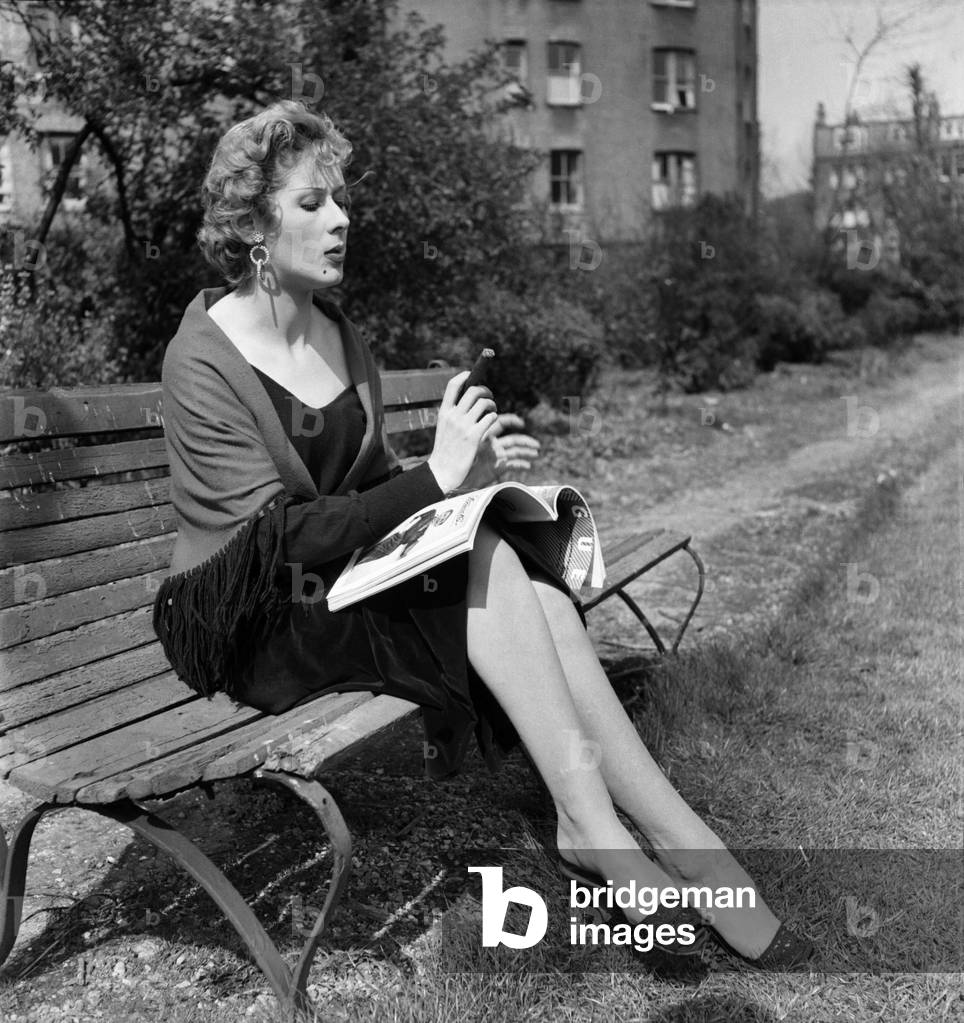 Gaby Silraire seen here smoking a cigar. April 1953 D2098-001