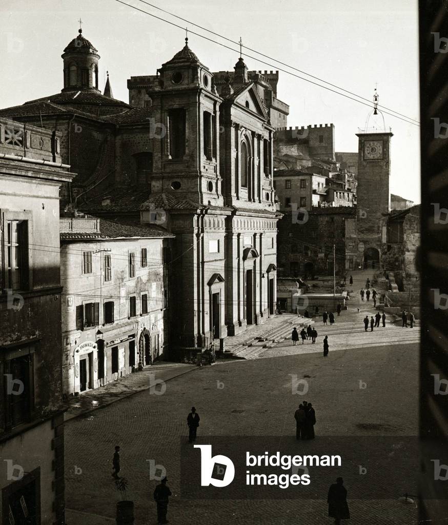 The Village Square - Soriano street scene - town centre people old buildings church, c. 1930 (b/w photo)