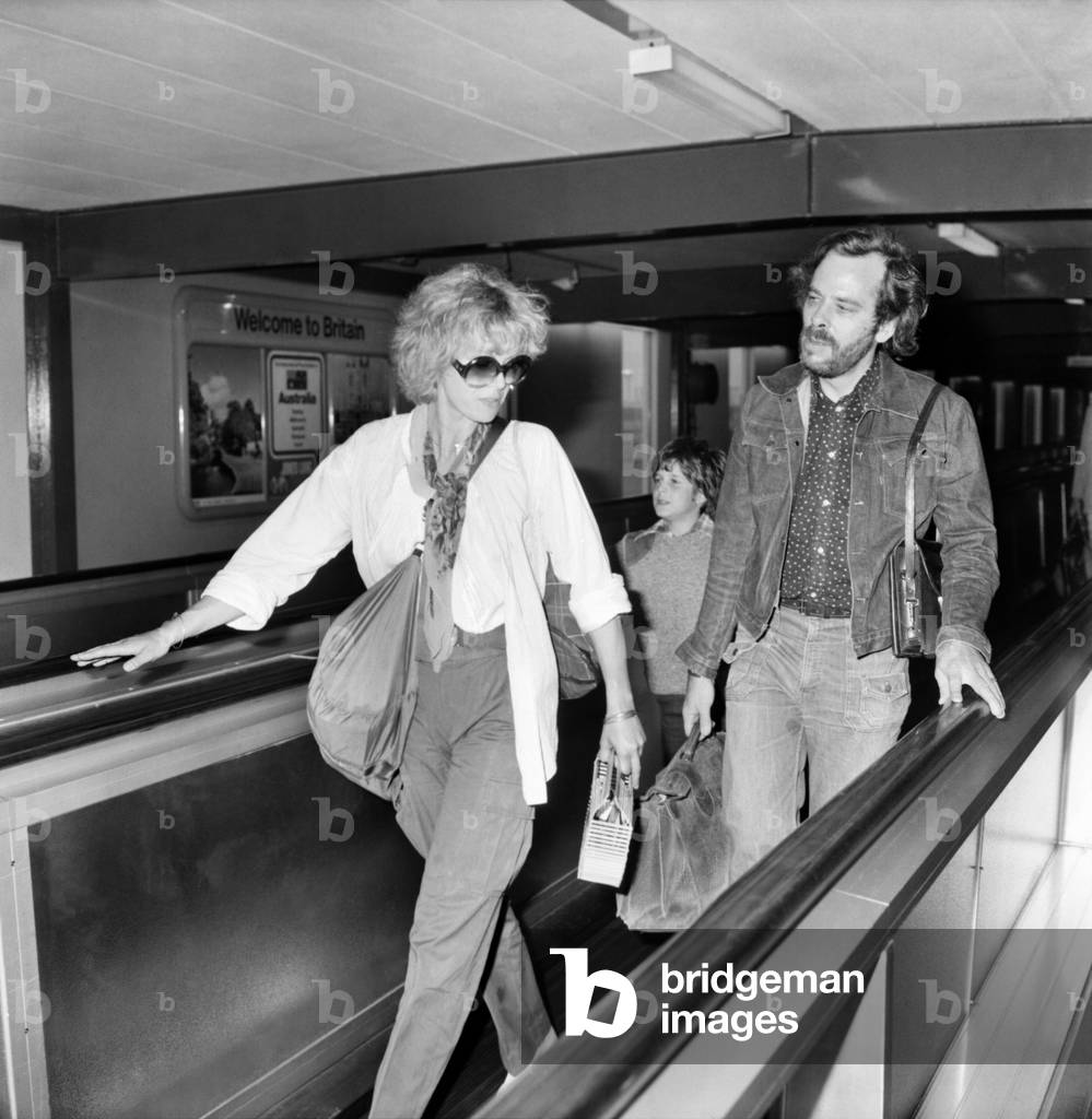 Joanna Lumley with her son and a friend seen leaving Heathrow Airport today for Canada, August 1977 (b/w photo)