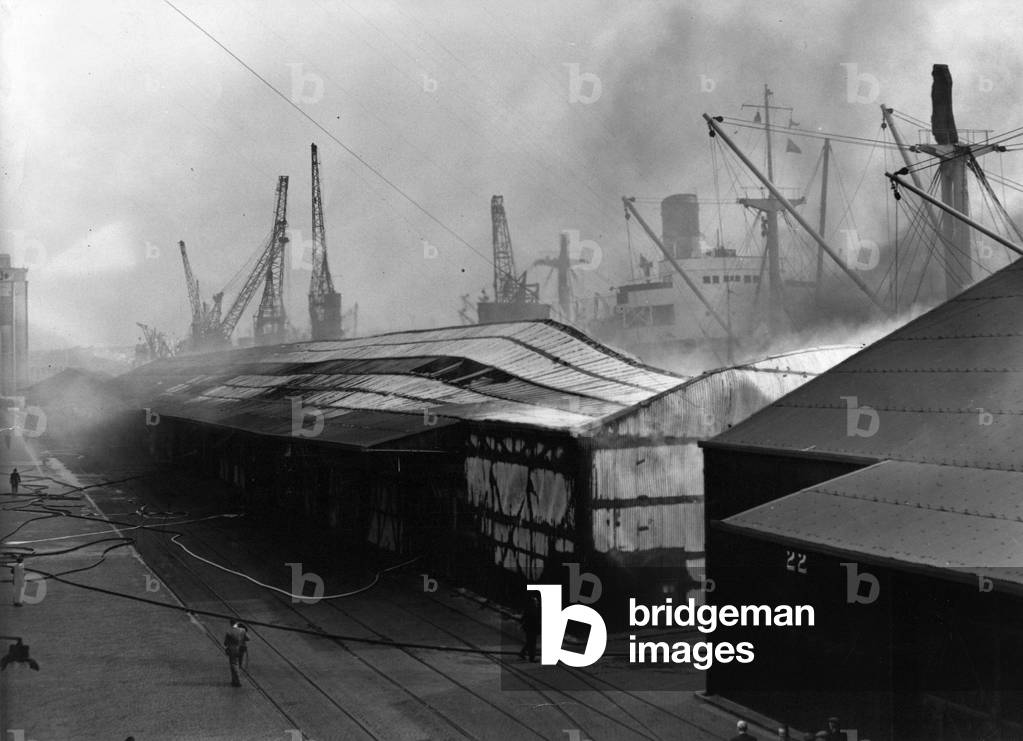 Firefighters batlle to contain the worst Newcastle Quayside blaze since the war when stocks of sisal worth £100,000 were lost when flames destroyed a wharf and badly damaged another and threatened a berthed ship, 1950