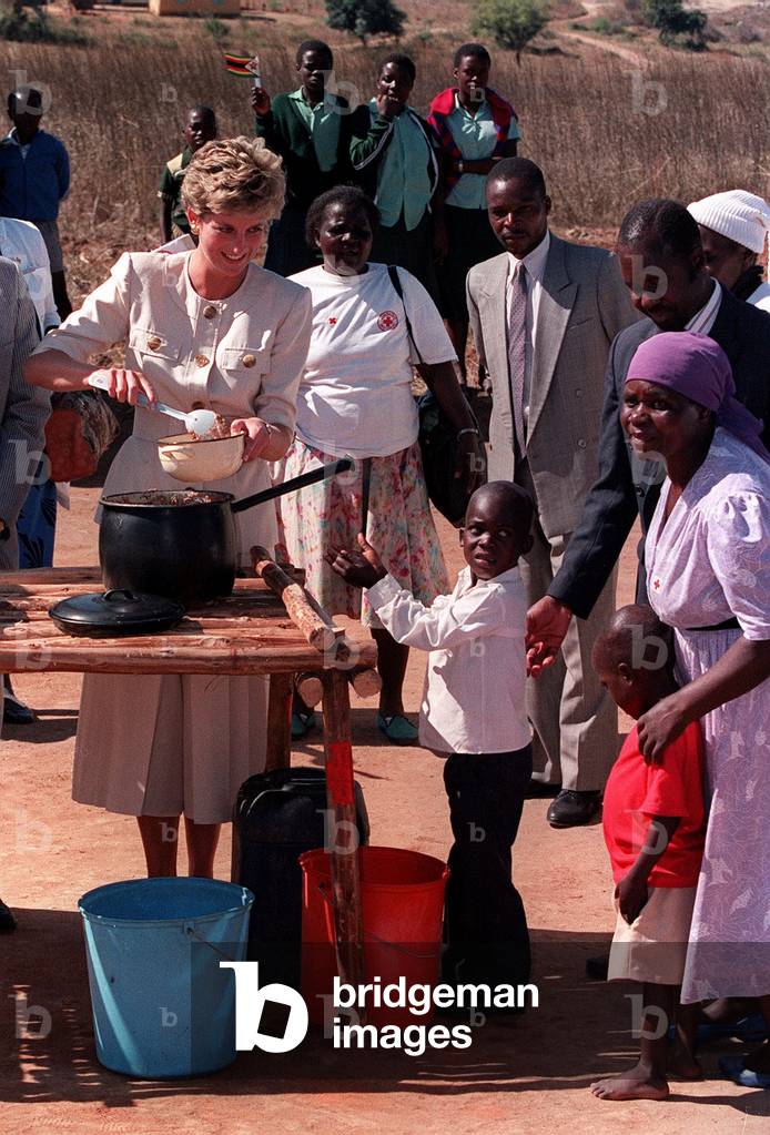 Princess Diana in Zimbabwe on humanitarian mission July 1993
serving food for local children