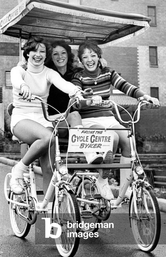 This bike kit makes two bikes into a romantic double bike with a seat and canopy. Our lovely Sunbirds Lix, Denise and Janice mastered the machine in next to no time and demonstrated that it can take three in comfort but only two can pedal, 1970