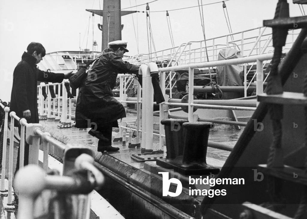 The Tees pilot Alan Lithgow waits his chance to jump aboard a tanker so he can pilot the ship into port. 7th November 1968 (b/w photo)