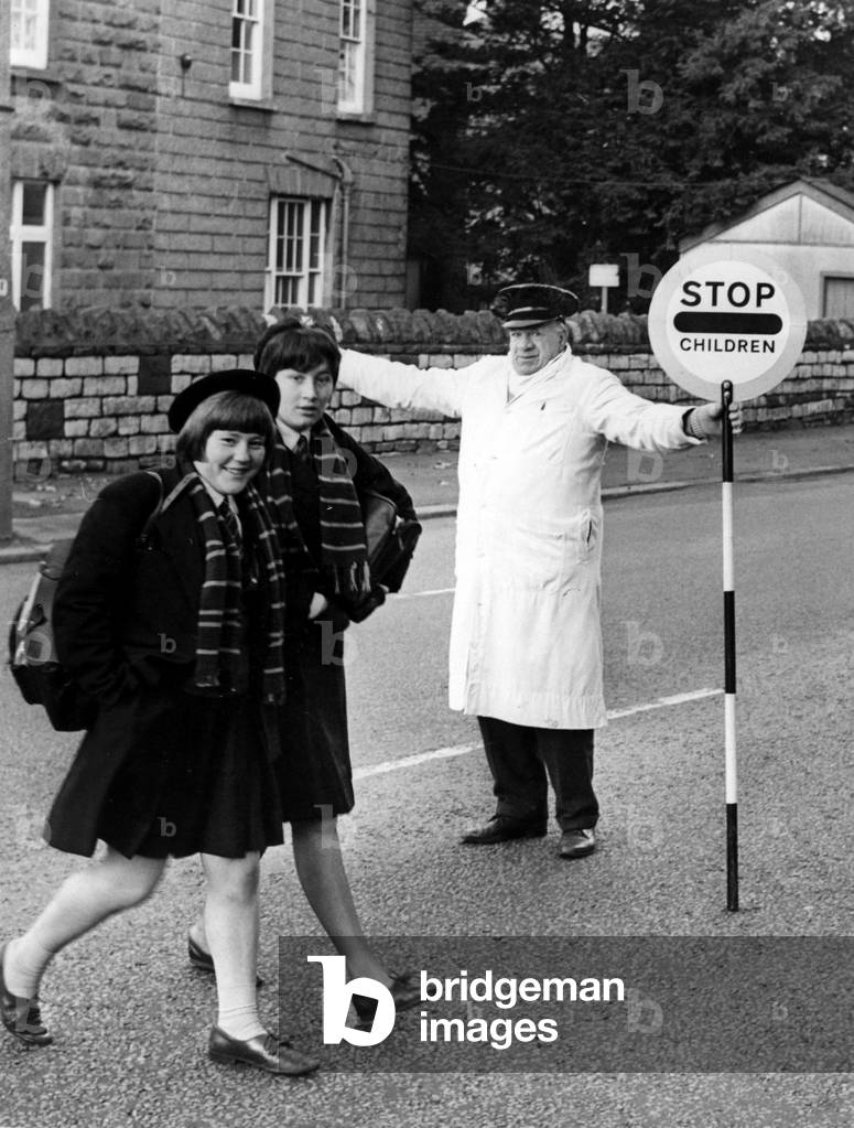 Road Safety - Lollipop Man/Woman - 74 year-old Mr Isaac Bacon of Gabalfa, Cardiff, sees children across a busy North Road, Cardiff to attend St Joseph's Convent School - 12th November 1965
