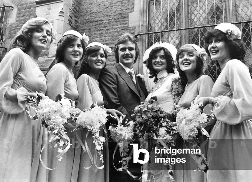 Anne Nolan and her groom Brian Wilson after their wedding yesterday (Saturday) with her sisters; Linda, Coleen, Maureen, Bernadette and Denise. 
June 1979