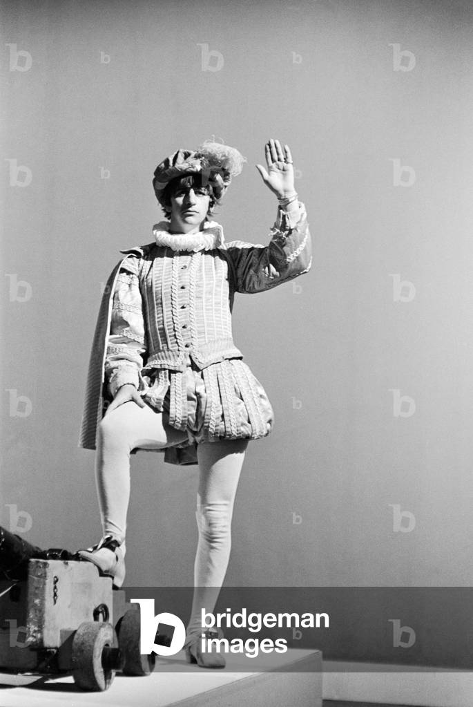 The Beatles performing at TV spectacular 'Around the Beatles' at Rediffusion's Wembley TV Studios. Ringo Starr dressed as Sir Francis Drake, firing a cannon at the start of the show. 28th April 1964 (b/w photo)