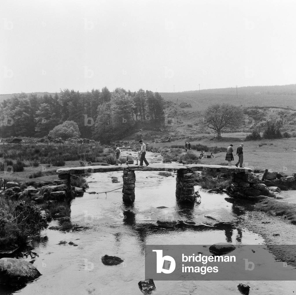 A quiet holiday at a beauty spot away from the more crowded roads was enjoyed by holidaymakers at Postbridge, Dartmoor.  21st May 1961 (b/w photo)