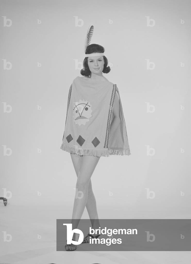 Reveille Fashion Feature Reveille Model Gloria Janes seen here modelling red Indian fashion December 1963 (b/w photo)