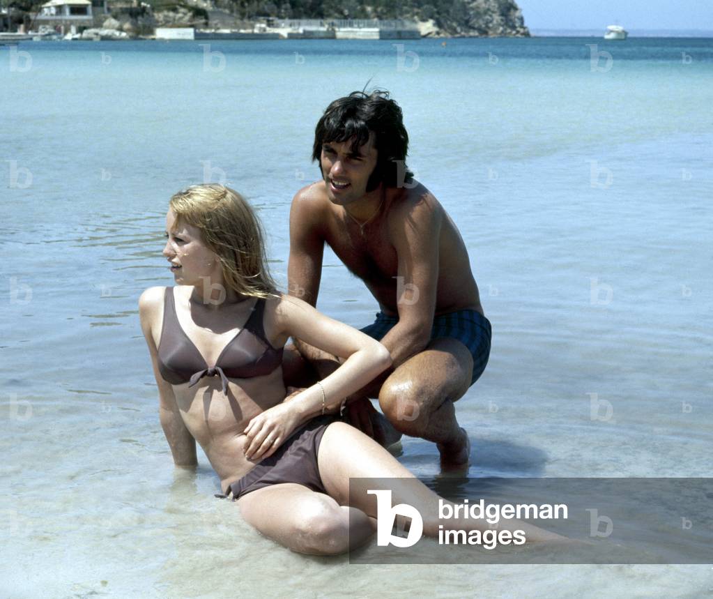 Manchester United footballer George Best on holiday with girlfriend Susan George while on holiday in Palma Nova, MajorcaJune 1969 (photo)