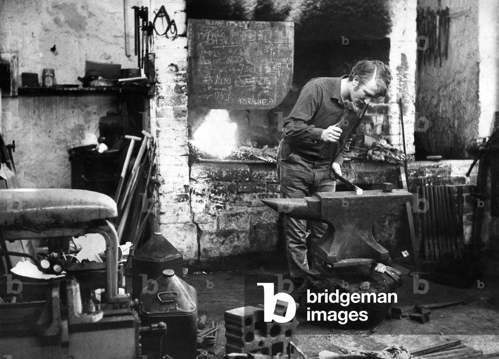 Mr. Charlton Amos working in his blacksmith's workshop at Heddon-on-the-Wall