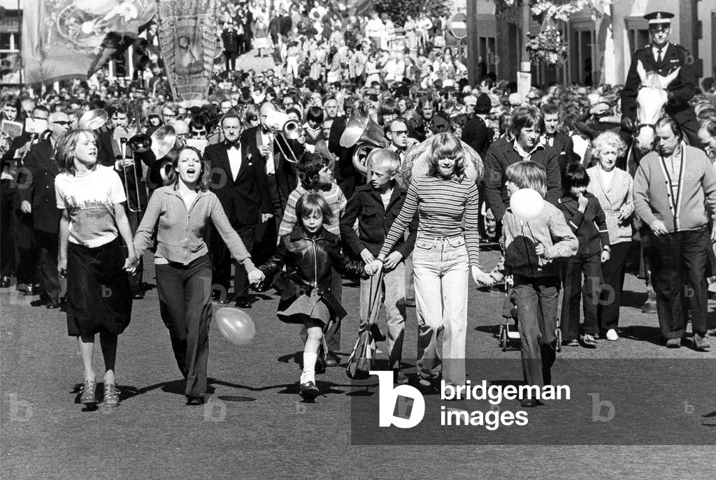 Durham Miners Gala, Young girls have a ball during the gala, 1970 (b/w photo)
