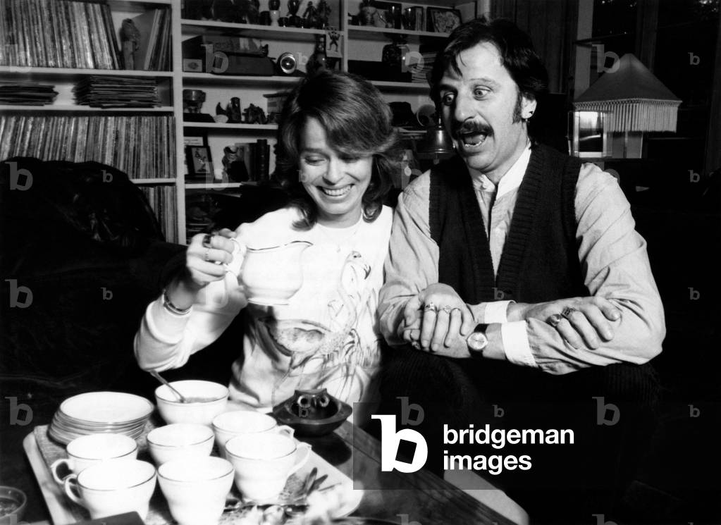 After two years in the pop wilderness, Ringo Starr has brought his music and his American wife Barbara home to Britain, for good. The ex-Beatle's 17th century mansion in Ascot is packed with memories. John Lennon and Yoko Ono lived here until they went to America. And when they moved out, Ringo and his first wife Maureen moved in for a while. Now he's here with actress Barbara Bach and her two children from a previous marriage. Ringo and Barbara in a lounge packed with mementos. November 1981 (b/w photo)